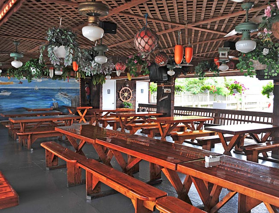 Carmen's dining room with picnic tables and string lights